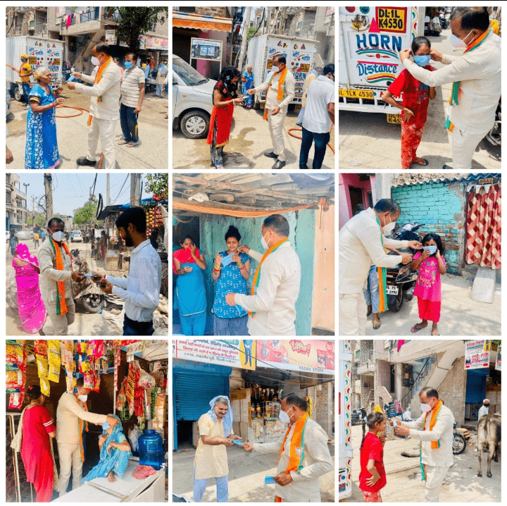 भलस्वा वार्ड में भोजन वितरण व मास्क,छेत्र में सैनिटाइज करवाया- Surrender Khrub Nigam Parshad 3 Photo1622393845765