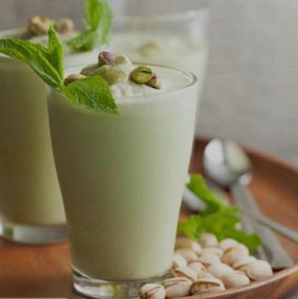 Kesar Pista Whisky Flip: A decadent after-dinner drink with scotch, pistachio syrup, saffron honey, and egg white for a creamy texture.